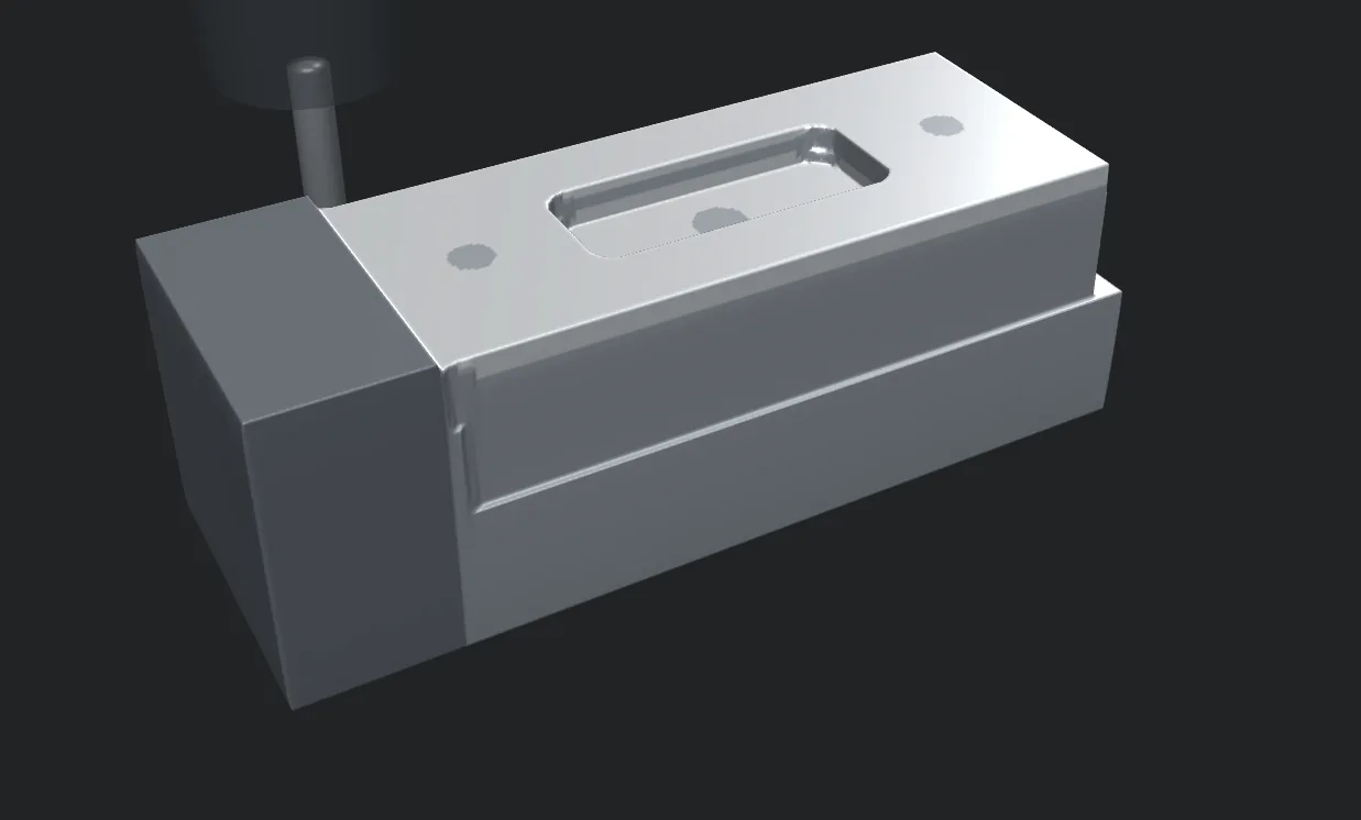 CAMstein simulation of a manifold block on a 4th axis, with the end mill finishing the pocket